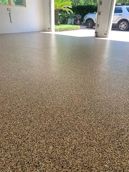 Epoxy Flooring project by Concrete Ideas Florida: High-gloss epoxy floor with reflective finish and seamless surface.