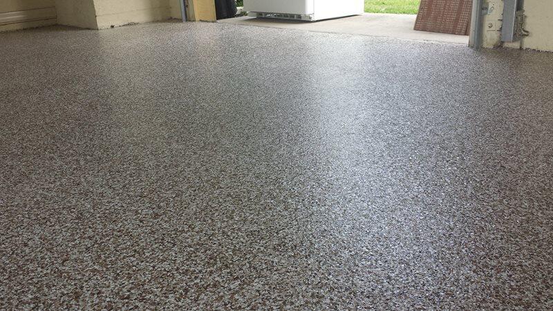 Epoxy Flooring project by Concrete Ideas Florida: Industrial epoxy floor with safety striping and durable protective coating.