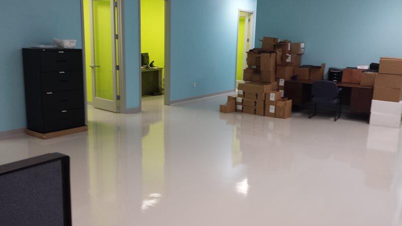 Epoxy Flooring project by Concrete Ideas Florida: Decorative flake epoxy system with broadcast chip texture and clear topcoat.