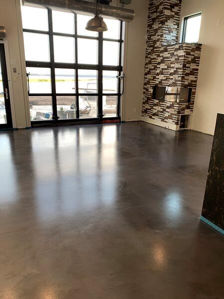 Metallic Epoxy project by Concrete Ideas Florida: High-gloss metallic epoxy finish with reflective surface and color variation.