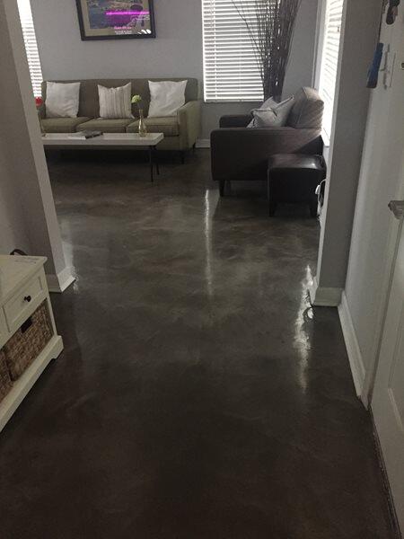 Metallic Epoxy project by Concrete Ideas Florida: High-gloss metallic epoxy finish with reflective surface and color variation.
