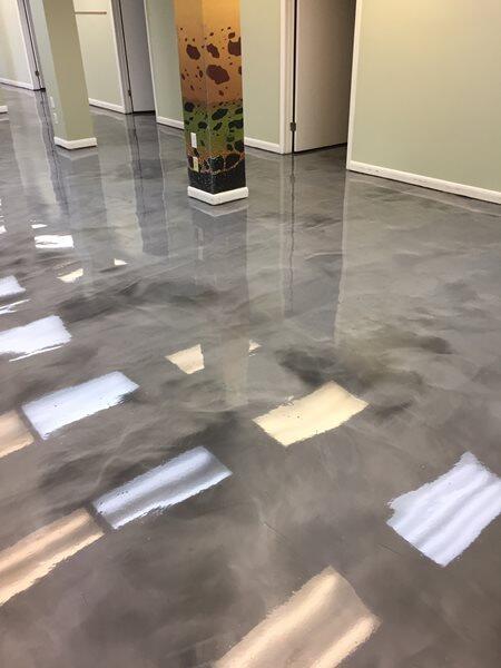 Metallic Epoxy project by Concrete Ideas Florida: Metallic epoxy floor with swirling color movement and high-gloss depth.