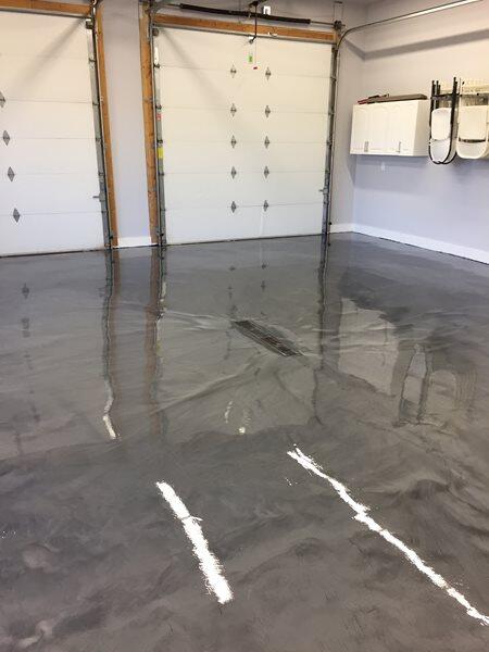 Metallic Epoxy project by Concrete Ideas Florida: Metallic epoxy garage floor with showroom-quality finish.