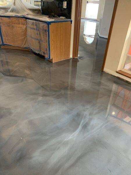 Metallic Epoxy project by Concrete Ideas Florida: Metallic epoxy garage floor with showroom-quality finish.