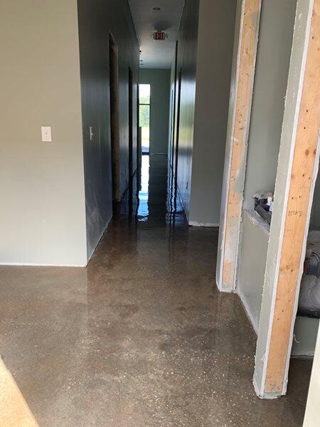 Sealed Concrete project by Concrete Ideas Florida: Sealed concrete floor with protective finish and clean reflectivity.