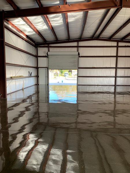 Sealed Concrete project by Concrete Ideas Florida: Sealed concrete floor with protective finish and clean reflectivity.
