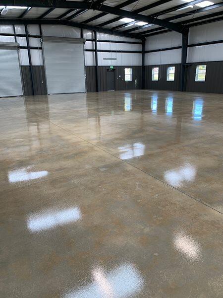 Sealed Concrete project by Concrete Ideas Florida: Sealed concrete floor with protective finish and clean reflectivity.