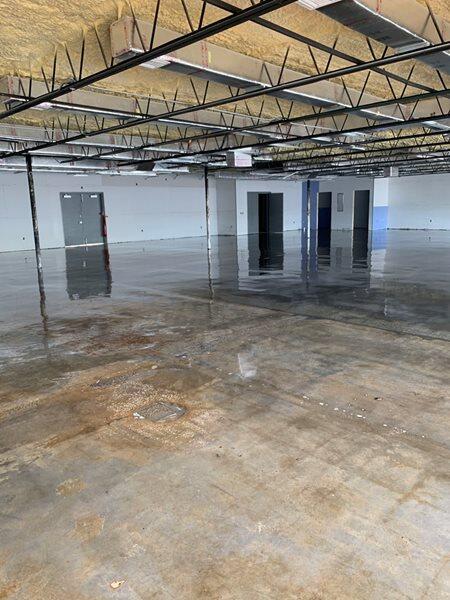 Sealed Concrete project by Concrete Ideas Florida: Sealed concrete floor with protective finish and clean reflectivity.