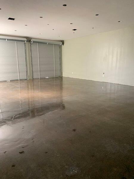 Sealed Concrete project by Concrete Ideas Florida: Sealed concrete floor with protective finish and clean reflectivity.