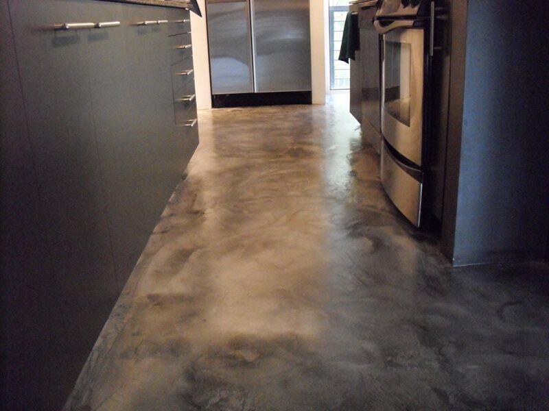 Stained Concrete project by Concrete Ideas Florida: Acid-stained concrete with natural color variation and protective finish.